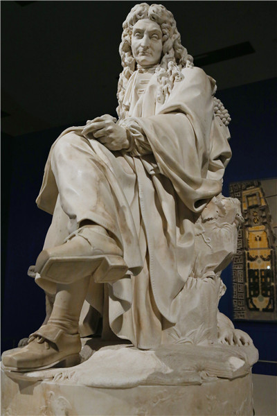 The Inventions of Louvre exhibition in Beijing features French sculptor Pierre Julien's Statue of Jean de la Fontaine. [Photo by Jiang Dong/China Daily]