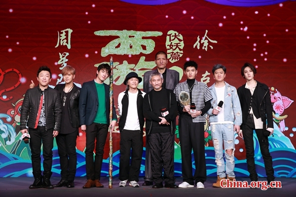 Huang Bo and Show Lo from first installment of 'Journey to the West: Conquering the Demons' show up on stage to pose for a group photo with Stephen Chow, Tsui Hark and cast members of 'Journey to the West: The Demons Strike Back' in Beijing, Jan. 16, 2017. [Photo/China.org.cn]