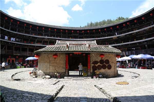 The Hakka people's tulou -- circular, fortified earthen buildings in Fujian Province. [Photo provided to China Daily]
