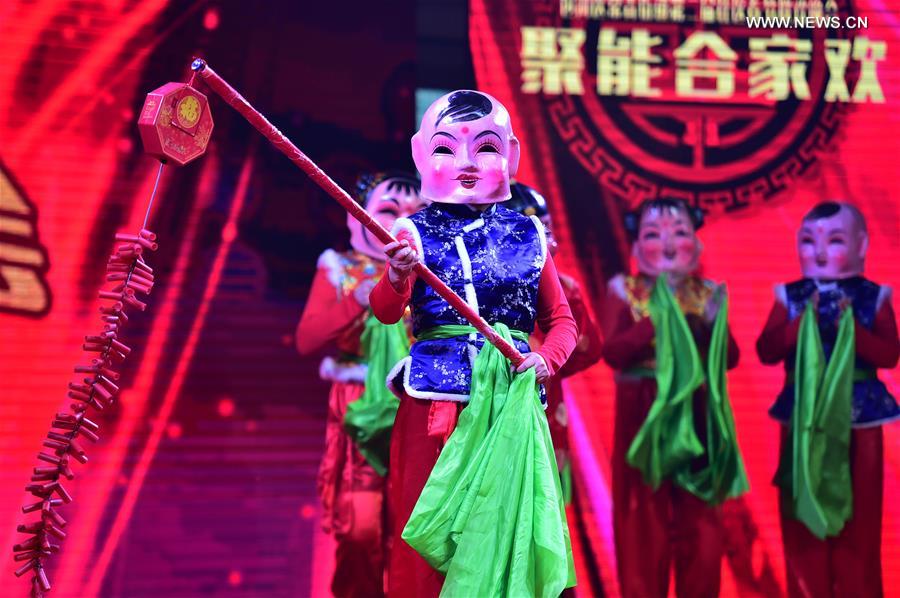 Residents dance at a community Spring Festival gala in Hefei City, east China's Anhui Province, Jan. 18, 2017. Residents from Changqing Subdistrict in Hefei staged a community Spring Festival gala to welcome the upcoming Lunar New Year. [Photo/Xinhua]
