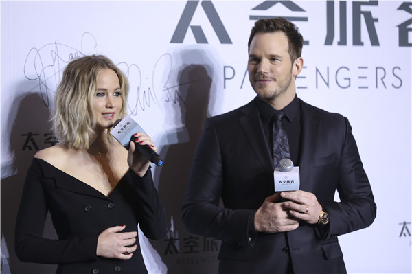 Lawrence and Pratt promote the US$120 million sci-fi epic 'Passengers' at a Beijing event. [Photo provided to China Daily]