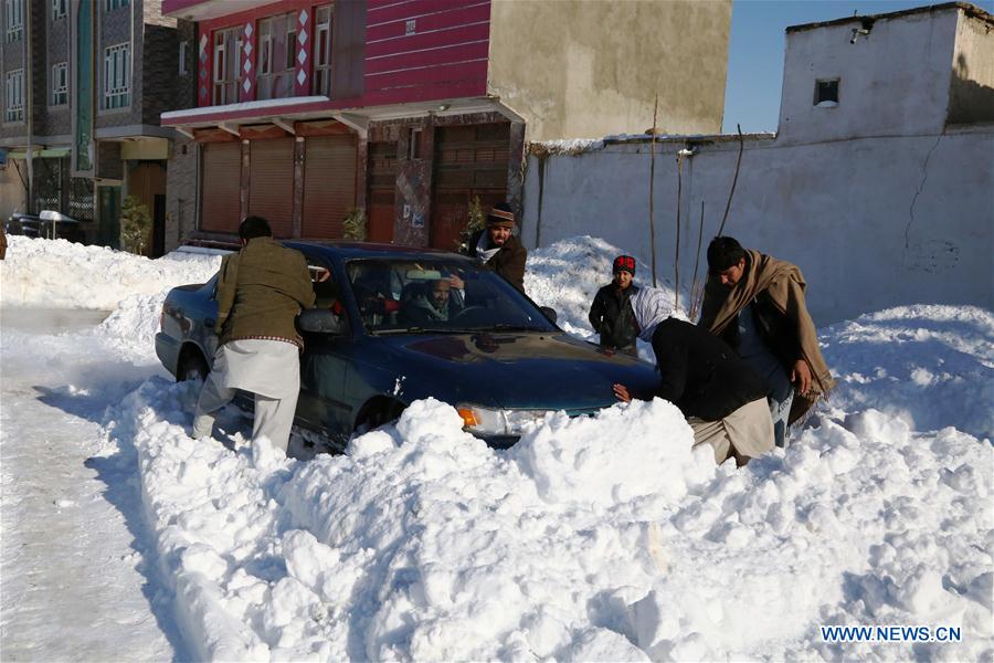 People push a car trapped in the snow in eastern Ghazni province, Afghanistan, Feb. 6, 2017. At least 100 people have lost their lives and more than 50 others sustained injuries due to snowfall and freezing weather over the past few days across Afghanistan, local media reported. (Xinhua/Sayed Mominzadah) 