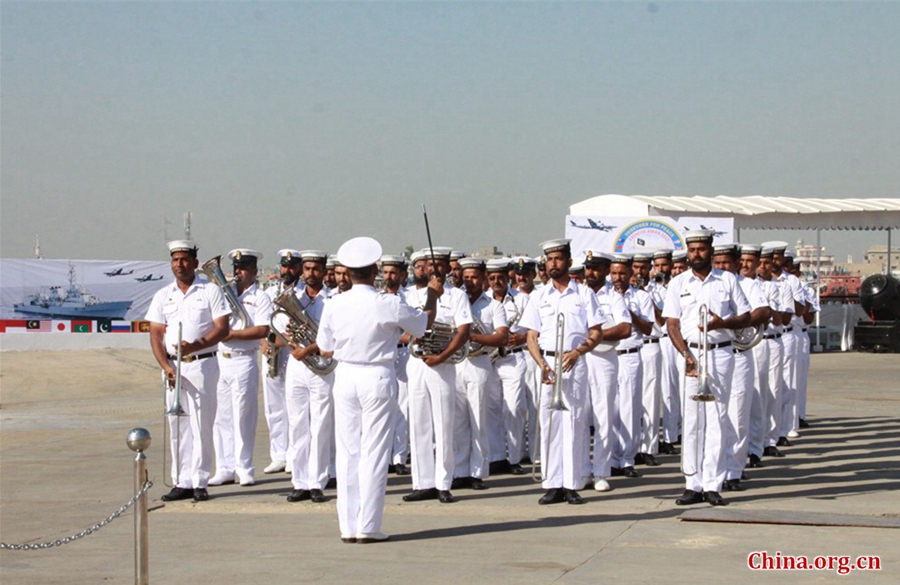Pakistan Navy band playing national songs at the int’l flag raising ceremony, which marks the opening of multinational naval exercise AMAN-17 at Pakistan Navy Dockyard in Karachi on Feb. 10, 2017. [China.org.cn / by Guo Xiaohong]