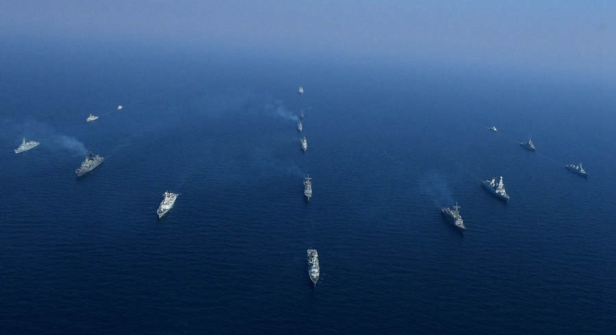 Ships of Pakistan Navy and other participating navies of the world make an arrow formation in North Arabian Sea on the conclusion day of Exercise AMAN 17, Feb. 14, 2017. [Photo courtesy of Pak Navy]