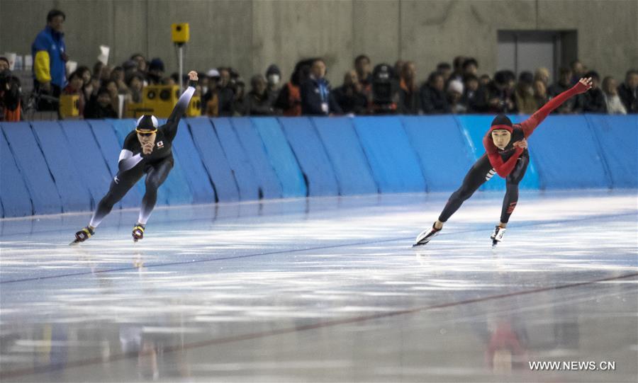 China&apos;s Gao Mingyu (R) and Japan&apos;s Tsubasa Hasegawa compete during men&apos;s 500m speed skating at the 2017 Sapporo Asian Winter Games in Sapporo, Japan, Feb. 20, 2017. Gao Mingyu claim the title of the event with 34.69 seconds and Tsubasa Hasegawa won the silver medal with 34.79 seconds. (Xinhua/Jiang Wenyao) 