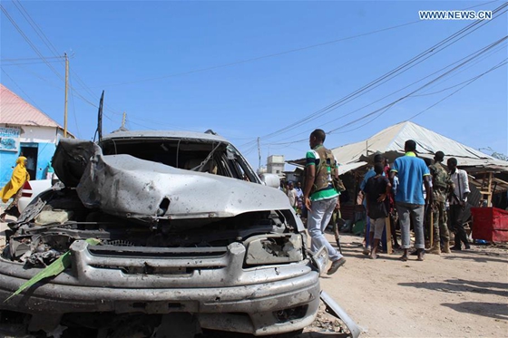 Photo taken on Feb. 19, 2017 shows the wreckage of a car at an explosion site in Mogadishu, Somalia. [Photo/Xinhua]