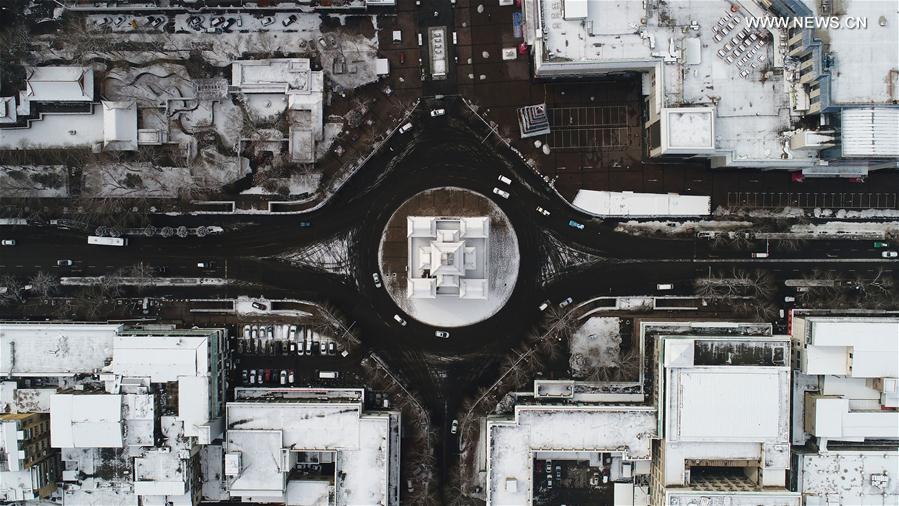 Aerial photo taken on Feb. 21, 2017 shows snow scenery at the drum tower in Yinchuan, northwest China's Ningxia Hui Autonomous Region. [Photo/Xinhua]