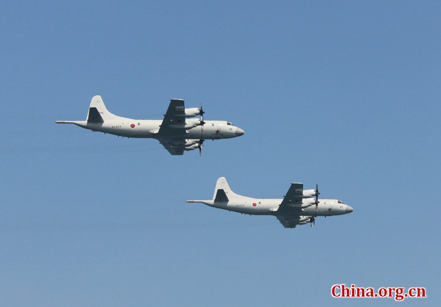 Two Japanese warplanes flying past. The AMAN-17 multinational naval exercise concludes with a spectacular exercise in the North Arabian Sea off Pakistan on Feb. 14, 2017. [Photo by Guo Xiaohong/China.org.cn]