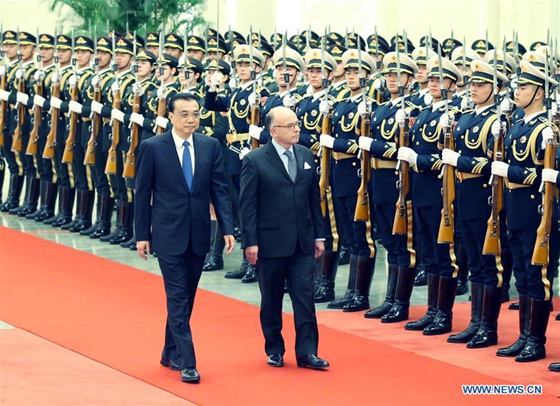 Chinese Premier Li Keqiang (L) holds a welcome ceremony for French Prime Minister Bernard Cazeneuve before their talks in Beijing, capital of China, Feb. 21, 2017. [Photo/Xinhua]