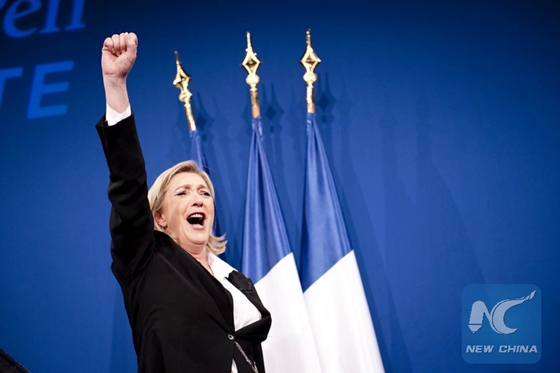 National Front candidate Marine Le Pen speaks at a rally after the first round of the 2012 French presidential election in Paris, France, April 22, 2012. [Photo/Xinhua]