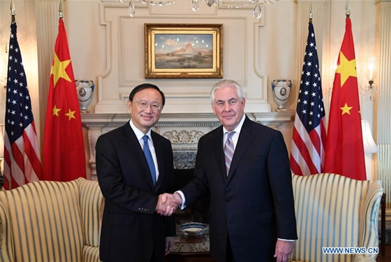 Visiting Chinese State Councilor Yang Jiechi (L) shakes hands with U.S. Secretary of State Rex Tillerson during their meeting in Washington D.C., the United States, on Feb. 28, 2017. [Photo/Xinhua]