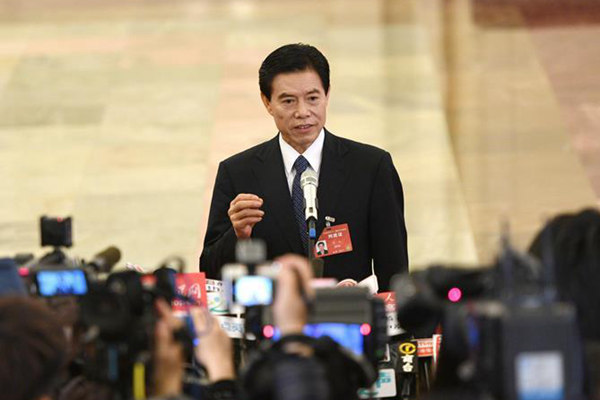 Chinese Commerce Minister Zhong Shan receives an interview before the opening of the fifth session of the 12th National Committee of the Chinese People's Political Consultative Conference in Beijing, capital of China, March 3, 2017. (Xinhua/Wang Jianhua)