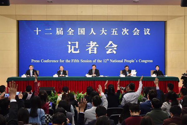 Director of the National Development and Reform Commission (NDRC) He Lifeng, vice directors of the NDRC Zhang Yong and Ning Jizhe, take questions on China's economic and social development and macro-economic control during a press conference for the fifth session of the 12th National People's Congress in Beijing, capital of China, March 6, 2017. (Xinhua/Li Xin)