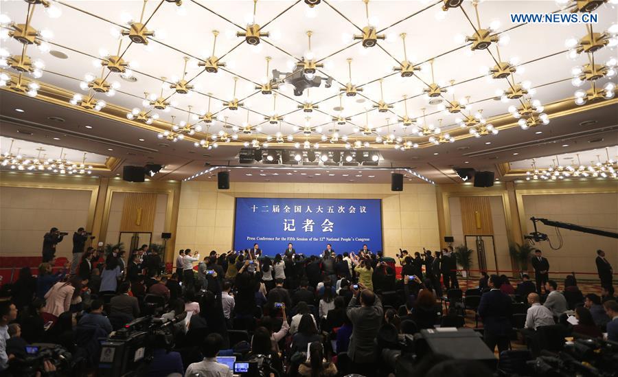 Chinese Minister of Finance Xiao Jie and Assistant Minister Dai Bohua take questions on reform of fiscal and taxation system and financial work at a press conference for the fifth session of the 12th National People's Congress in Beijing, capital of China, March 7, 2017. (Xinhua/Fei Maohua) 
