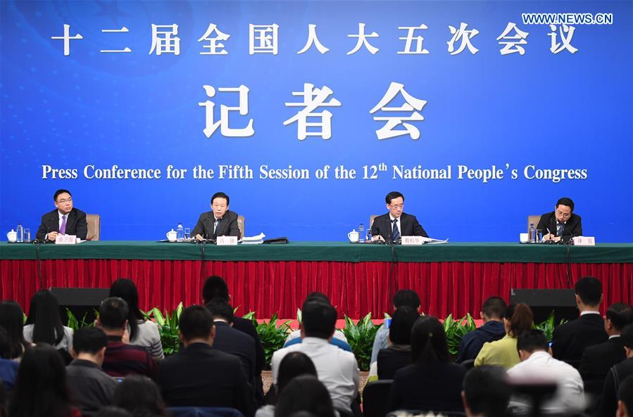 Chinese Minister of Finance Xiao Jie and Assistant Minister Dai Bohua take questions on reform of fiscal and taxation system and financial work at a press conference for the fifth session of the 12th National People's Congress in Beijing, capital of China, March 7, 2017. (Xinhua/Chen Yehua) 