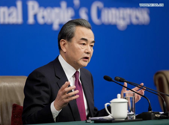 Chinese Foreign Minister Wang Yi answers questions on China's foreign policy and foreign relations at a press conference for the fifth session of the 12th National People's Congress in Beijing, capital of China, March 8, 2017. [Photo/Xinhua]