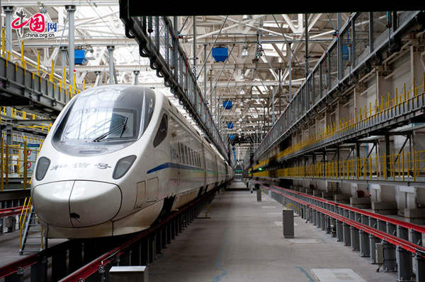 A CRH train is ready for examination in EMU (electronic multiple unit) Center. [Photo by Chen Boyuan / China.org.cn]