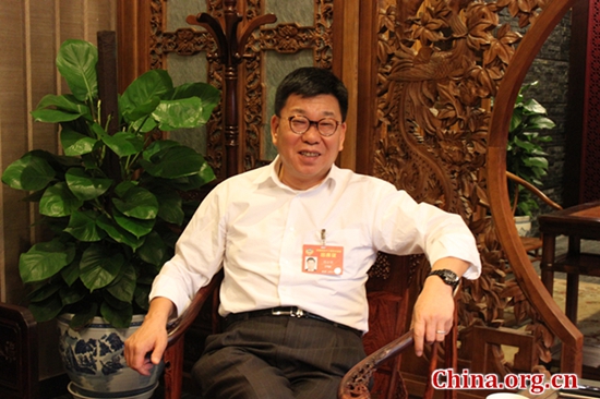 Han Fangming, the founding chairman of the Charhar Institute and vice chairman of the Foreign Affairs Committee of the National Committee of CPPCC, speaks to a China.org.cn reporter in Beijing, March 11, 2017. [Photo/ China.org.cn]
