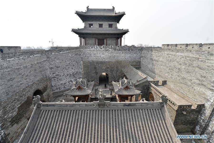 这是3月16日拍摄的明太原县城北瓮城。目前，建设中的明太原县城复兴工程进展顺利，城内古建筑修缮和环境整治等工作正在进行。据悉，位于山西省太原市晋源区晋源镇的明太原县城建于1375年。虽经600多年风雨，明太原县城仍保存较好。2011年，明太原县城被列入国家级历史文化街区。为加强保护，当地政府2012年启动明太原县城复兴工程。 [新华社]