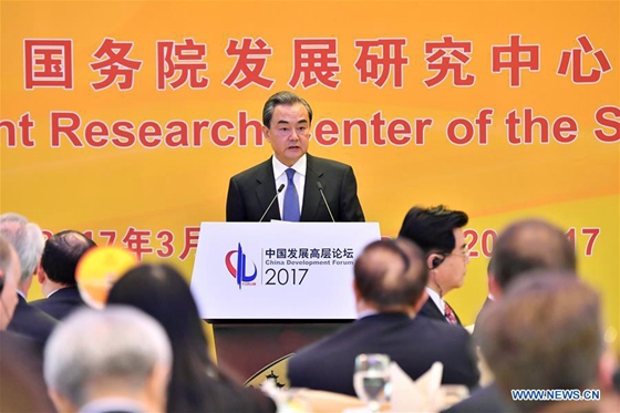 Chinese Foreign Minister Wang Yi delivers a speech at the China Development Forum 2017 in Beijing, capital of China, March 20, 2017. [Photo/Xinhua] 