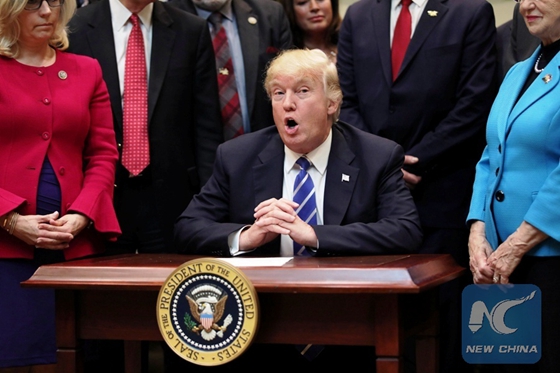 U.S. President Donald Trump speaks during a bill signing event in the Roosevelt room of the White House in Washington, U.S., March 27, 2017. [Photo/Xinhua]