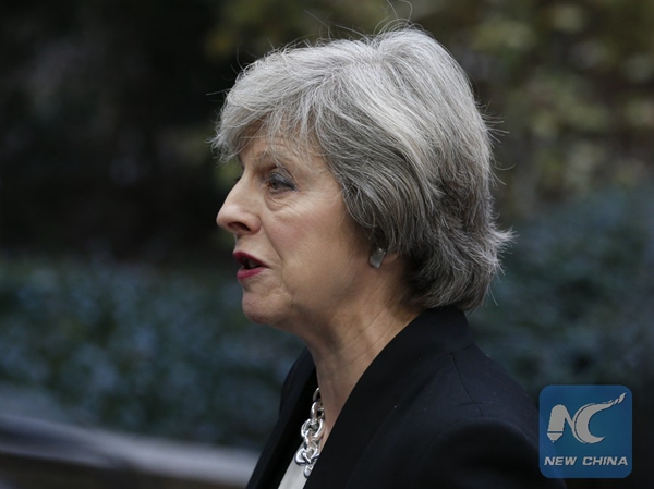British Prime Minister Theresa May arrives at EU Summit at its headquarters in Brussels, Belgium, Dec. 15, 2016. [Photo/Xinhua]