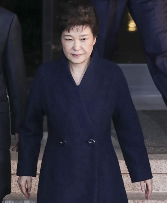 Ousted South Korean President Park Geun-hye leaves the prosecutors' office in Seoul, South Korea, March 22, 2017. [Photo/Xinhua]