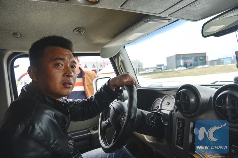 China-Kazakhstan border trade drives Hummer driver&apos;s dream for fortune
