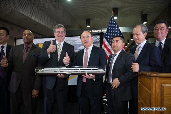 China Railway Rolling Stock Corporation (CRRC) President Xi Guohua (4th R) attends the signing ceremony in Los Angeles, the United States, April 12, 2017. [Photo/Xinhua]