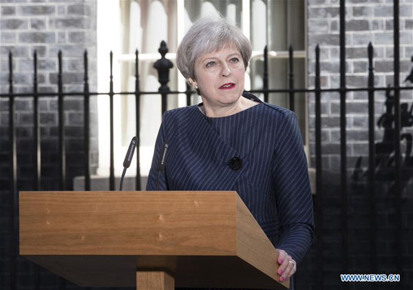 British Prime Minister Theresa May speaks to media outside 10 Downing Street as she calls a snap general election in London, Britain, on April 18, 2017. British Prime Minister Theresa May called a snap general election on June 8 in what was a shock and unexpected announcement from outside 10 Downing Street. (Xinhua)