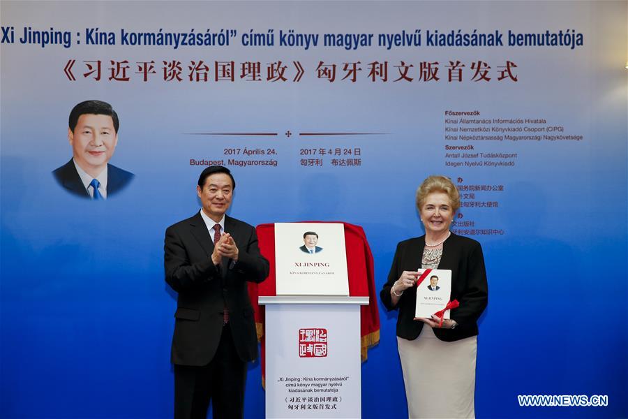 Liu Qibao (L), member of the Political Bureau of the Central Committee of the Communist Party of China (CPC) and head of the Publicity Department of the CPC Central Committee, and Matrai Marta, executive vice chairman of the Hungarian National Assembly, attend the release ceremony of the Hungarian version of Chinese President Xi Jinping's book 'Xi Jinping: the Governance of China' in Budapest, Hungary, on April 24, 2017. (Xinhua/Ye Pingfan)