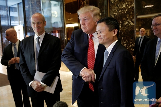 U.S. President-elect Donald Trump shakes hands with and Alibaba executive chairman Jack Ma after their meeting at Trump Tower in New York, U.S., January 9, 2017. [Photo/Xinhua]