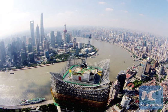 Photo taken on Sept. 11, 2015 shows an aerial view of the highest building in Puxi, east China's Shanghai Municipality. [Photo/Xinhua]