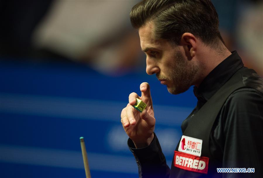 Mark Selby of England reacts during the third session of the semifinal against Ding Junhui of China during the World Snooker Championship 2017 at the Crucible Theatre in Sheffield, Britain on April 28, 2017. (Xinhua/Jon Buckle)