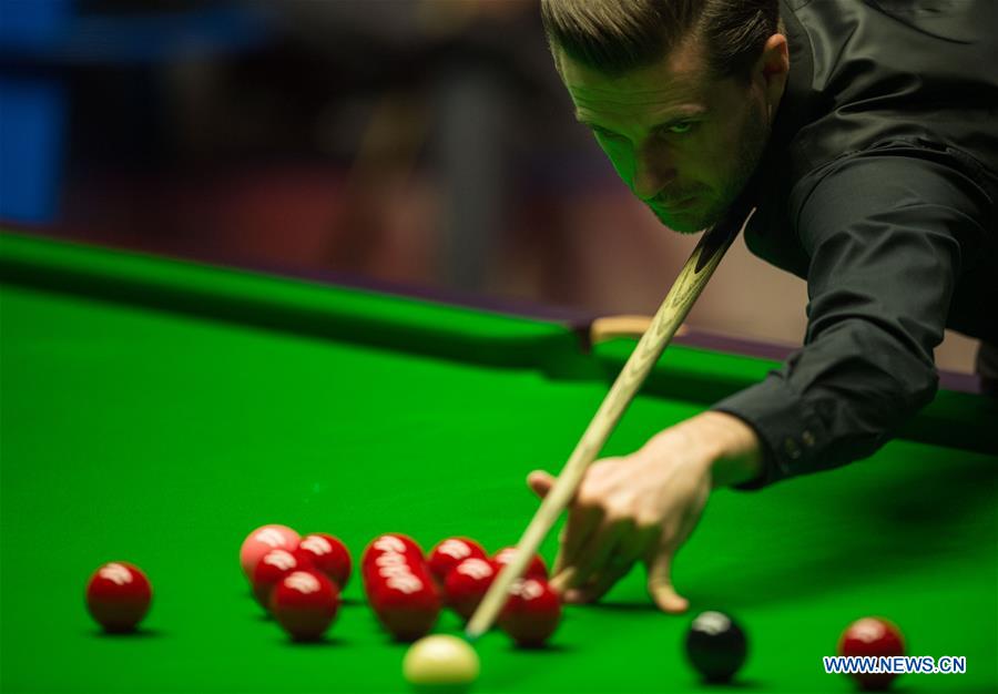 Mark Selby of England competes during the third session of the semifinal against Ding Junhui of China during the World Snooker Championship 2017 at the Crucible Theatre in Sheffield, Britain on April 28, 2017. (Xinhua/Jon Buckle)