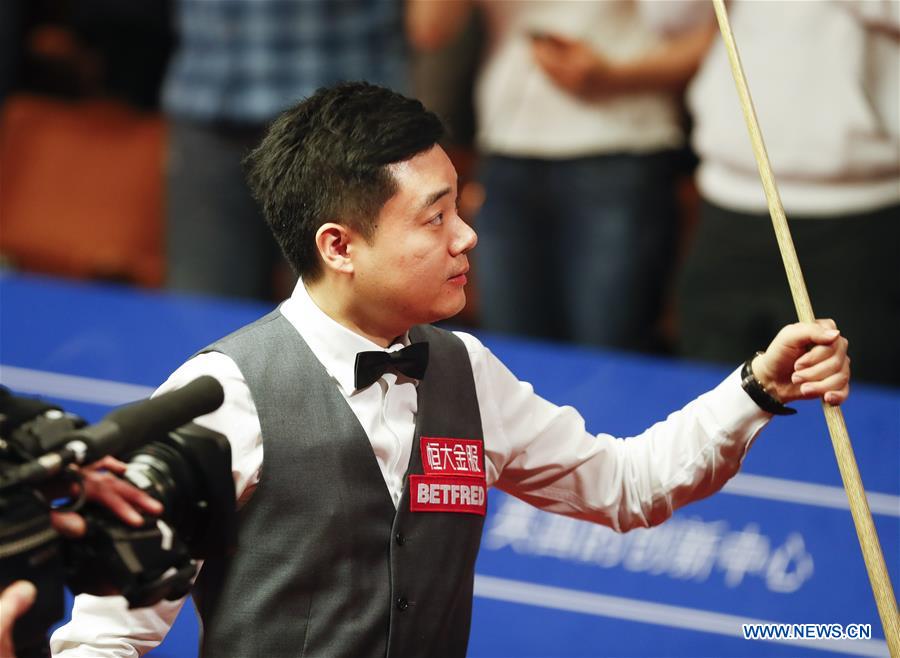 Ding Junhui of China reacts after the third session of the semifinal against Mark Selby of England during the World Snooker Championship 2017 at the Crucible Theatre in Sheffield, Britain on April 28, 2017. (Xinhua/Han Yan)