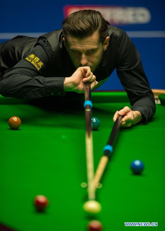 Mark Selby of England competes during the third session of the semifinal against Ding Junhui of China during the World Snooker Championship 2017 at the Crucible Theatre in Sheffield, Britain on April 28, 2017. (Xinhua/Jon Buckle)