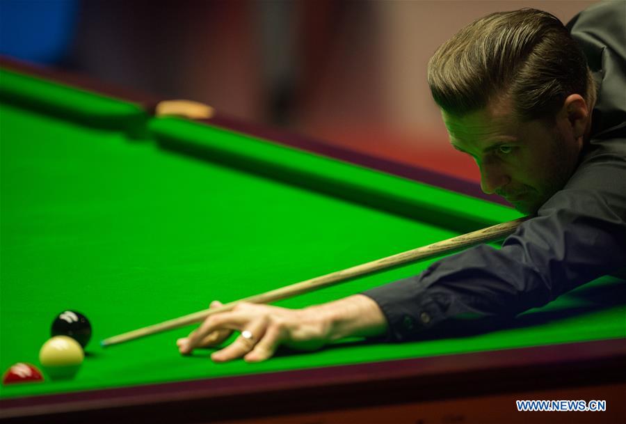 Mark Selby of England competes during the third session of the semifinal against Ding Junhui of China during the World Snooker Championship 2017 at the Crucible Theatre in Sheffield, Britain on April 28, 2017. (Xinhua/Jon Buckle)