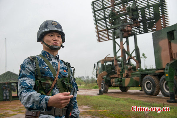 Guo Tao, commander a mobile radar force of the Southern Theater Command of the PLA (People's Liberation Army) speaks about the battalion's resolution to guard the country's airspace during a training at an undisclosed location. [Photo by Chen Boyuan / China.org.cn]