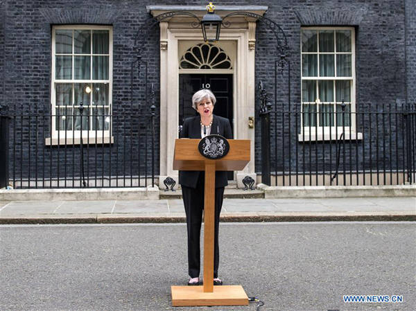 Britain's Prime Minister Theresa May addresses the media in Downing Street after chairing a meeting of Britain's emergency security committee following the Manchester terror attack in London, Britain on May 23, 2017. (Xinhua)