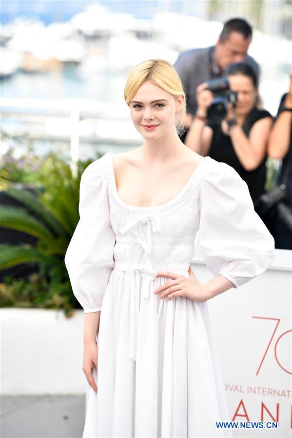 Actress Elle Fanning of the film &apos;The Beguiled&apos; poses for a photocall in Cannes, France on May 24, 2017. The film &apos;The Beguiled&apos; directed by American director Sofia Coppola will compete for the Palme d&apos;Or on the 70th Cannes Film Festival. (Xinhua/Chen Yichen)