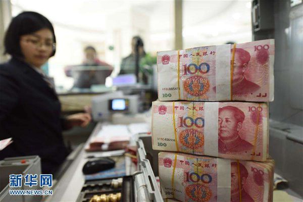 China plans to change a formula for forming the yuan-U.S. dollar central parity rate. [Xinhua file photo]