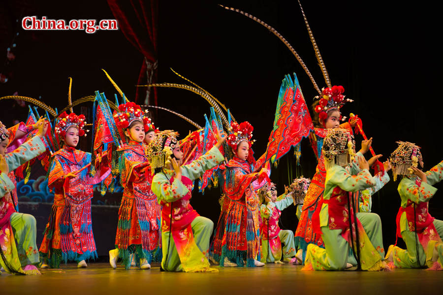 Children perform Peking Opera in Beijing on May 31, as part of an event celebrating the upcoming International Children’s Day. The event is held by Beijing-based not-for-profit organization China Soong Ching Ling Foundation. [Photo by Chen Boyuan/China.org.cn] 