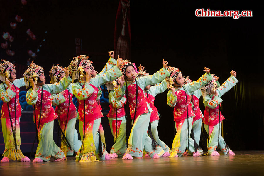 Children perform Peking Opera in Beijing on May 31, as part of an event celebrating the upcoming International Children’s Day. The event is held by Beijing-based not-for-profit organization China Soong Ching Ling Foundation. [Photo by Chen Boyuan/China.org.cn] 
