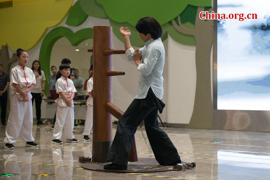 Children and their teachers perform Wing Chun kungfu during a grand celebration held at the newly established China Soong Ching Ling Science and Culture Center for Young People in Beijing on May 31, one day ahead of International Children&apos;s Day. The celebration, themed &apos;Dream of the Future Belt and Road Young Hearts,&apos; was organized by China Soong Ching Ling Foundation (CSCLF) in a bid to promote communication between young people from countries along the Belt and Road. [Photo by Chen Boyuan / China.org.cn]