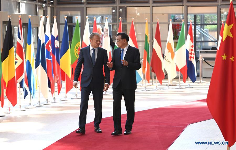 Chinese Premier Li Keqiang (R) and European Council President Donald Tusk enter the venue for the 19th China-EU leaders' meeting in Brussels, Belgium, June 2, 2017. [Photo/Xinhua]