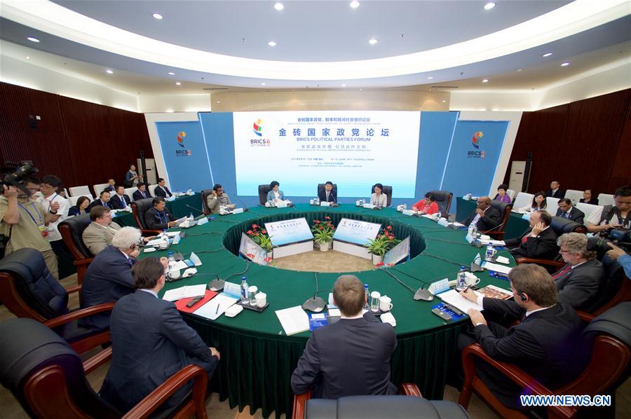 Representatives take part in the BRICS Political Parties Forum in Fuzhou, capital of southeast China&apos;s Fujian Province, June 10, 2017. Representatives of political parties, think-tanks and non-governmental organizations from BRICS countries took part in the BRICS Political Parties, Think-tanks and Civil Society Organizations Forum here on Saturday. (Xinhua/Jiang Kehong) 
