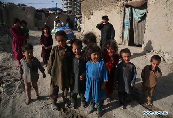 Afghan displaced children are seen in Kabul, Afghanistan, June 20, 2017, the World Refugee Day. 