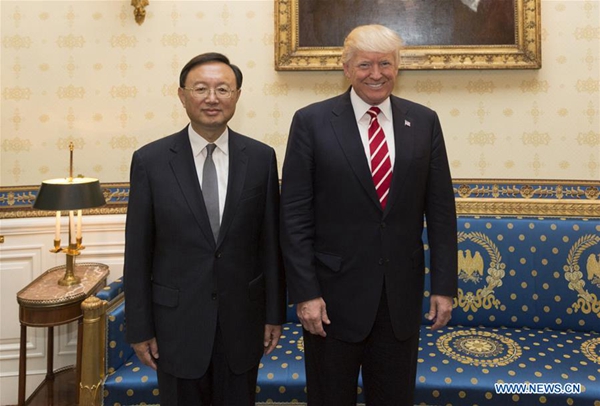 U.S. President Donald Trump (R) meets with Chinese State Councilor Yang Jiechi in Washington D.C. June 22, 2017. Yang Jiechi was in Washington D.C. to attend the first round of China-U.S. diplomatic and security dialogue. [Photo/Xinhua]