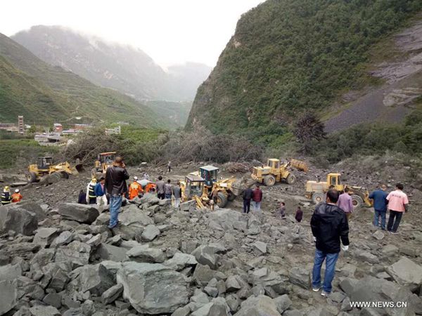 Photo taken on June 24, 2017 shows the accident site after a landslide occurs in Xinmo Village of Maoxian County, Tibetan and Qiang Autonomous Prefecture, southwest China's Sichuan Province. A total of 46 homes are said to be buried, and 141 people are missing. [Photo/Xinhua]